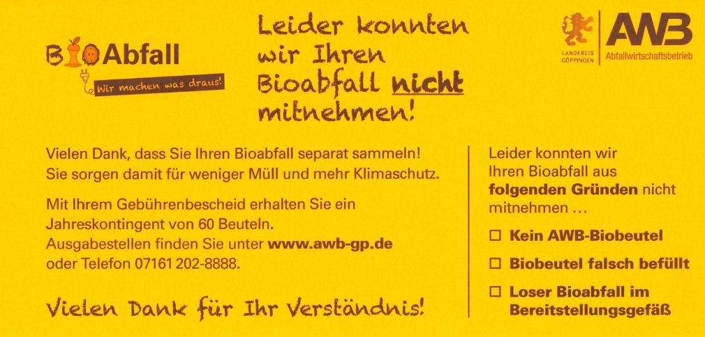 gelber Aufkleber für Reklamationen bei der Biomüll-Abfuhr